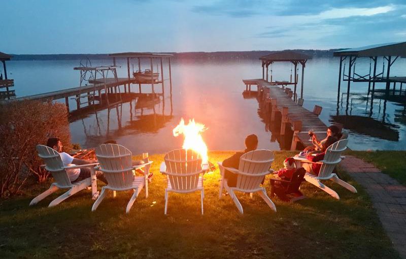 Guest photo of a campfire beside the lake