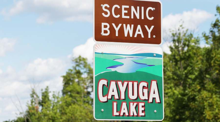 Scenic Byway Cayuga Lake sign on a sunny day 